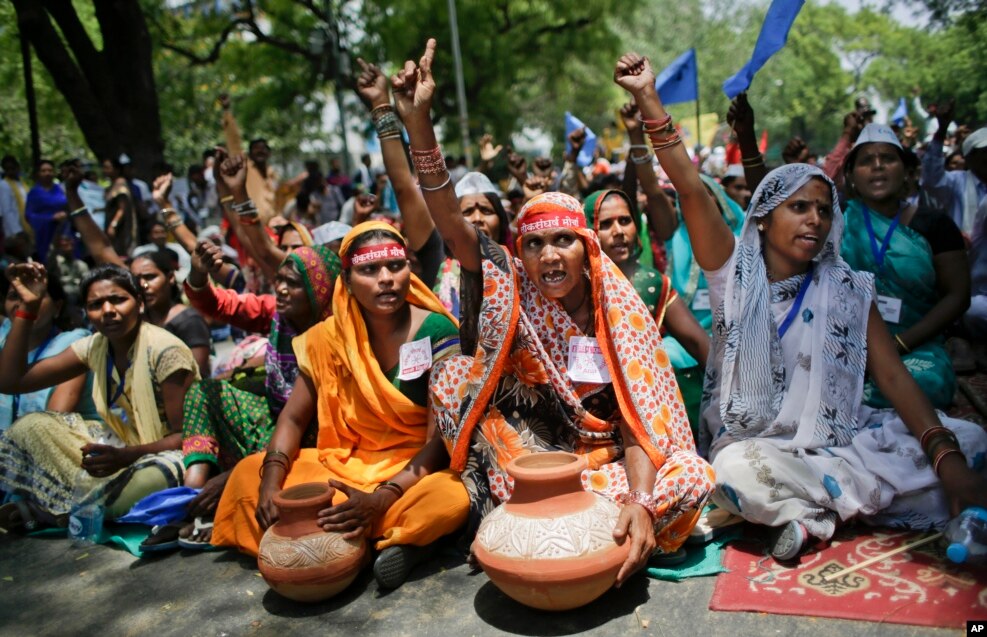 Villagers from various Indian states shout slogans during a protest demonstration to highlight the water shortage across the country in New Delhi, India.