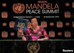 Graca Machel, member of The Elders, speaks at the Nelson Mandela Peace Summit during the 73rd United Nations General Assembly in New York, Sept. 24, 2018.