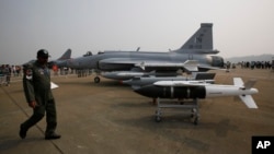 FILE - An FC-1 Xiaolong multirole fighter is displayed at the 8th China International Aviation and Aerospace Exhibition in Zhuhai, China.