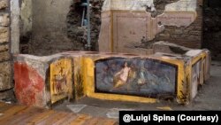 This image provided by the Pompeii Archeological park press office shows the thermopolium in the Pompeii archeological park, near Naples, Italy. @Luigi Spina (Courtesy)