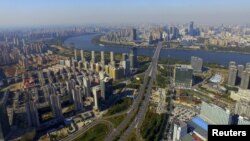 FILE - An aerial view shows the city skyline of Shenyang, Liaoning province, China, Oct. 18, 2015.