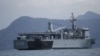 FILE - A Malaysian navy vessel patrols waters near Langkawi Island, May 16, 2015. Malaysia is buying four ships from China to help it patrol its coastline.