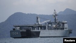 FILE - A Malaysian navy vessel patrols waters near Langkawi Island, May 16, 2015. Malaysia is buying four ships from China to help it patrol its coastline.