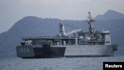 FILE - A Malaysian navy vessel patrols waters near Langkawi Island, May 16, 2015. Malaysia is buying four ships from China to help it patrol its coastline.