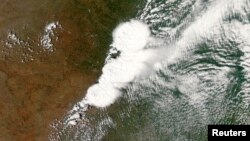 Gambar yang diambil oleh NASA menunjukkan sistem badai yang menimbulkan tornado F-4 di Moore, Oklahoma (20/5).