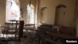 The interior of a damaged school is pictured in the old city of Homs, Syria, March 2, 2013.