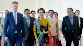 Myanmar's State Counsellor Aung San Suu Kyi departs from Naypyidaw International Airport ahead of her appearance at the International Court of Justice to defend the country against charges of genocide of its Rohingya Muslim minority, in Naypyidaw, Myanmar