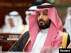 ອົງມົງກຸດລາດຊະກຸມມານ Mohammed bin Salman ແຫ່ງຊາອຸດີ ອາຣາເບຍ ເຂົ້າຮ່ວມກອງປະຊຸມສະພາຊູຣາ ໃນຣີຢັດ, ຊາອຸດີ ອາຣາເບຍ, 19 ພະຈິກ 2018.