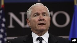 US Defense Secretary Robert Gates speaks during a media conference after a meeting of NATO defense ministers at NATO headquarters in Brussels, June 9, 2011.