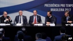 Foreign ministers of Mercosur, from left, Argentina's Jorge Faurie, Paraguay's Eladio Loizaga, Brazil's Aloysio Nunes, Sao Paulo Mayor's Joao Doria, and Uruguay's Foreign Minister Rodolfo Nin Novoa, give a statement to the media, in Sao Paulo, Brazil, Aug. 5, 2017. The South American trade bloc has decided to suspend Venezuela for failing to follow democratic norms.
