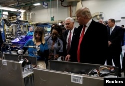 President-elect Donald Trump tours a Carrier factory with Vice President-elect Mike Pence in Indianapolis, Indiana, Dec. 1, 2016.