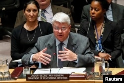 FILE - Herve Ladsous, head of the U.N. Department of Peacekeeping Operations, speaks to Security Council representatives in New York, Oct.14, 2014.