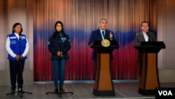 De izquierda a derecha Gina Tambini, delegada en Colombia de la Organización Panamericana de la Salud, Martha Ospina, Directora Instituto Nacional de Salud, Iván Duque, presidente Colombia, Fernando Ruiz, Ministro de Salud Colombia. Foto Manuel José Arias Najarro.