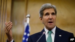 FILE - U.S. Secretary of State John Kerry participates in a joint press conference with Jordan’s Foreign Minister Nasser Judeh in Amman, Jordan, Nov. 7, 2013.