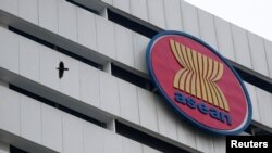 A bird flies near the Association of Southeast Asian Nations (ASEAN) secretariat building, ahead of the ASEAN leaders' meeting in Jakarta, Indonesia, April 23, 2021. REUTERS/Willy Kurniawan