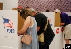 People vote early at the Oklahoma County Board of Elections, June 21, 2018, in Oklahoma City.
