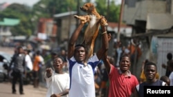 Des militants de l'opposition manifestent contre le président Joseph Kabila, à Kinshasa, en RDC, le 19 décembre 2016.