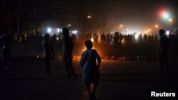 FILE - Sudanese demonstrators take part in an anti-government protest in Khartoum, Sudan, Jan. 25, 2019.