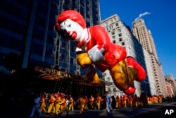 Inflables gigantes son parte del del Desfile del Día de Gracias de Macy's, el miércoles 22 de noviembre de 2018 en Nueva York.