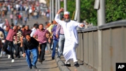 Các người biểu tình của cả 2 phía ở Ai Cập cáo buộc các nhiếp ảnh gia là người của phía bên kia
