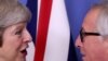 La Première ministre britannique Theresa May, avec le président de la Commission européenne, Jean-Claude Juncker, le 11 décembre 2018.