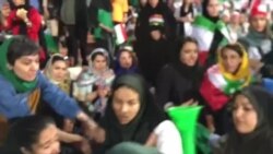 Iranian Policewomen Try to Detain a Female Football Fan