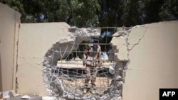 Zgrada oštećena u napadima u Libiji