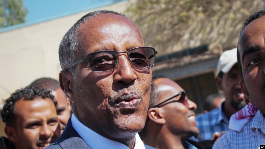 Ruling party candidate Muse Bihi Abdi speaks to the media after casting his vote in the presidential election in Hargeisa, Somaliland, Nov. 13, 2017.