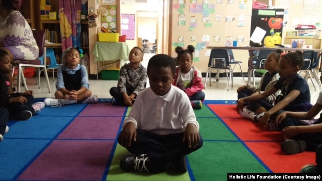 Students take part in the Mindful Moment Program in Baltimore, Maryland.