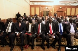 FILE - Members of South Sudan rebel delegation attend the opening ceremony of South Sudan's negotiation in Ethiopia's capital Addis Ababa, Jan. 4, 2014.