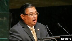 FILE - Myanmar's Minister for Foreign Affairs Wunna Maung Lwin addresses the 69th United Nations General Assembly at the U.N. headquarters in New York, Sept. 29, 2014.