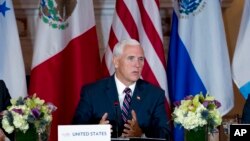 Wakil Presiden AS Mike Pence berbicara dalam pertemuan di Departemen Luar Negeri di Washington, 11 Oktober 2018.
