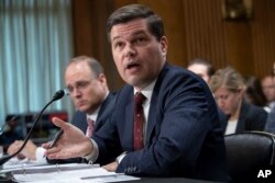 Wess Mitchell, assistant secretary of State for European and Eurasian Affairs and Marshall Billingslea, assistant Treasury secretary for terrorist financing, left, testify as the Senate Committee on Foreign Relations holds a hearing on U.S. relations with Russia, Aug. 21, 2018.