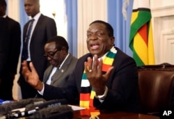 FILE - Zimbabwean President elect Emmerson Mnangagwa addresses a press conference in Harare, Aug, 3, 2018.