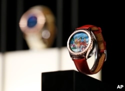 FILE - Samsung Gear S2 Classic smart watches are on display during a Samsung news conference at CES Press Day at CES International, Jan. 5, 2016, in Las Vegas. The flexible sensor developed at UC Berkeley can be made into wristbands or headbands that provide continuous, real-time analysis of the chemicals in sweat. In the NIH project, volunteers will help take exams beyond the standards, to include even day-to-day wellness information gathered from smartphones or wearable sensors.