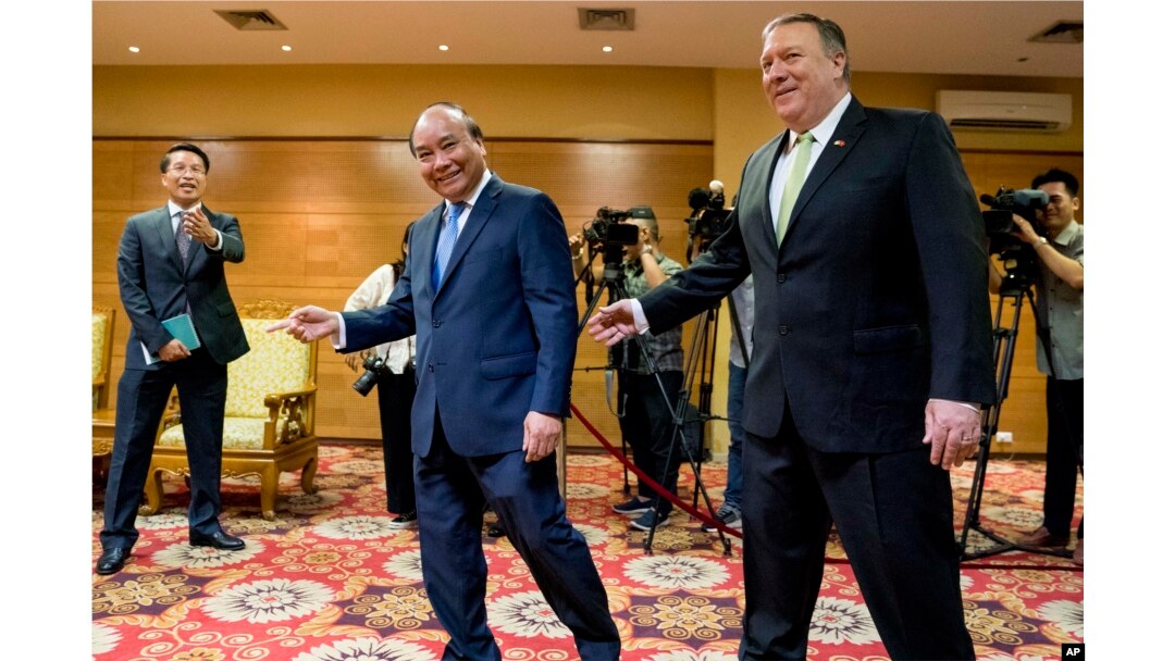 U.S. Secretary of State Mike Pompeo, right, meets with Vietnamese Prime Minister Nguyen Xuan Phuc at the International Convention Center in Hanoi, Vietnam, July 9, 2018.