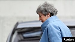 FILE - Britain's Prime Minister Theresa May is seen at Downing Street, in London, Britain, March 18, 2019.