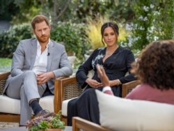 Britain's Prince Harry and Meghan, Duchess of Sussex, are interviewed by Oprah Winfrey in this undated handout photo. Harpo Productions/Joe Pugliese/Handout via REUTERS/File Photo