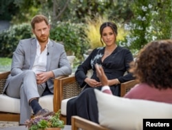 Britain's Prince Harry and Meghan, Duchess of Sussex, are interviewed by Oprah Winfrey in this undated handout photo. Harpo Productions/Joe Pugliese/Handout via REUTERS/File Photo