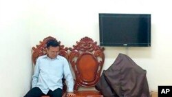 Kem Sokha assis à la cour d'appel lors de l'audition d'une demande de libération sous caution à Phnom Penh, au Cambodge, le 1er février 2018.