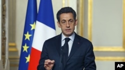 France's President Nicolas Sarkozy delivers a speech following an employment summit with labor union representatives at the Elysee Palace in Paris, January 18, 2012.