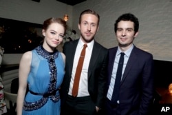 Emma Stone, Ryan Gosling and writer/director Damien Chazelle seen at the Los Angeles Premiere of "La La Land" afterparty at Village Theatre, Dec. 6, 2016, in Los Angeles.