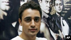 Bollywood actor Imran Khan poses for a picture during a promotional event for his forthcoming movie 'Luck' at a radio station in Mumbai, July 20, 2009