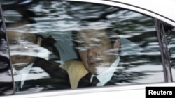 FILE - Taiwan's President Ma Ying-jeou leaves the Istana after paying his respects to Singapore's first prime minister Lee Kuan Yew, in Singapore.