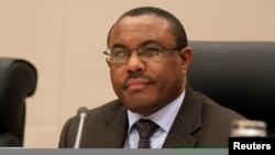 Ethiopia's Prime Minister Hailemariam Desalegn, shown here at an Extraordinary Summit of Intergovernmental Authority on Development (IGAD) Heads of State on Jan. 31, 2014, says IGAD member states "will take action" if South Sudan fails to respect the blueprint signed Aug. 26, for creating a transitional government and restoring peace. 