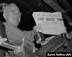 The Washington Post wasn't the only newspaper that had to eat crow. Here, Truman U.S. President Harry S. Truman holds up an Election Day edition of the Chicago Daily Tribune, Nov. 1948.