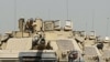 Binh sĩ Hoa Kỳ rời Iraq trong khi tranh cãi về chiến tranh vẫn tiếp tục