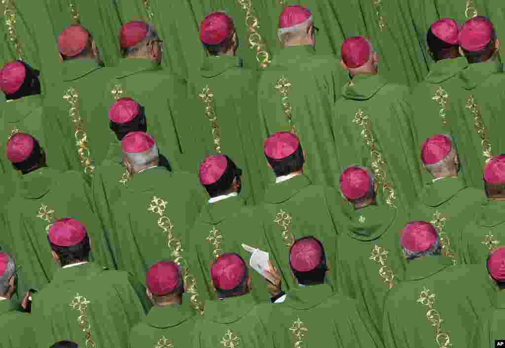 Bishops attend a Mass celebrated by Pope Francis for the opening of a synod in St. Peter&#39;s Square at the Vatican.