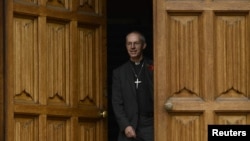 The Bishop of Durham, and the newly appointed Archbishop of Canterbury, Justin Welby, leaves after a news conference at Lambeth Palace, in London, November 9, 2012.