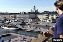 La Plaza del Mercado y el palacio presidencial en Helsinki, Finlandia, el 28 de junio de 2018. El presidente de los Estados Unidos, Donald Trump, y el presidente ruso, Vladimir Putin, se reunirán en Helsinki, la capital de Finlandia, el 16 de julio de 2018.